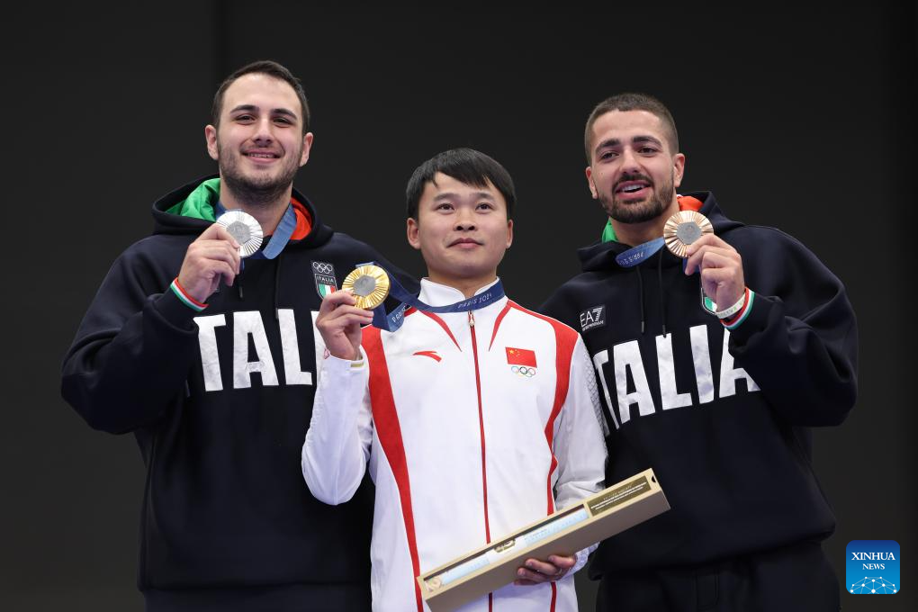 Xie Yu de China gana el oro en 10m pistola de aire